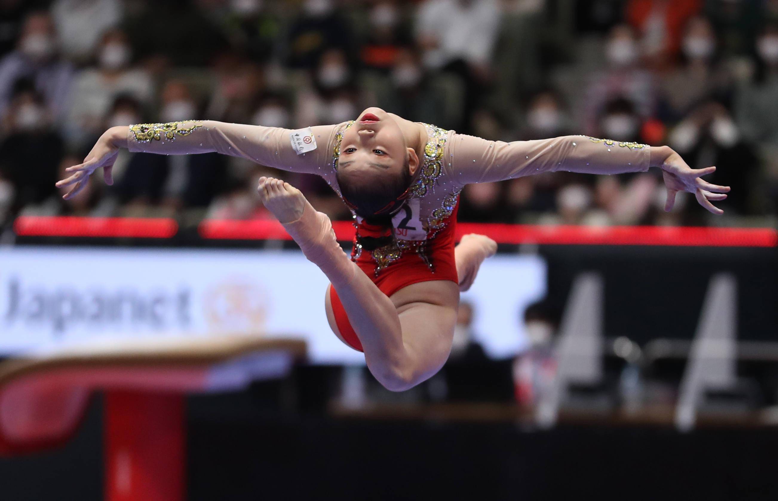 爱游戏网站-包含体操比赛平衡木表演精彩继续的词条